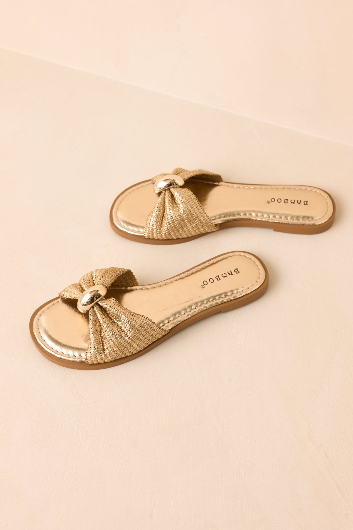 Harbor Light Gold Raffia Bow Slide Sandals